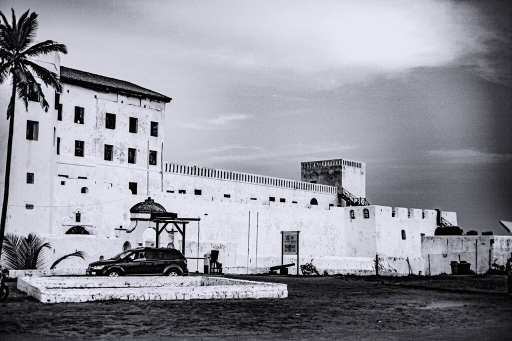 Mastering the First Impression: Your intriguing post title goes here A black and white view of Cape Coast Castle in Ghana, highlighting its historic architecture.